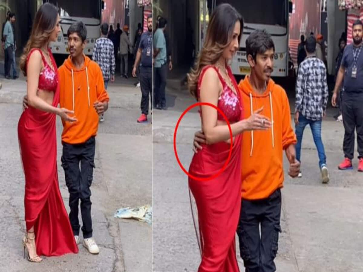 malaika arora fan puts hand on her waist actress reaction become talk of town